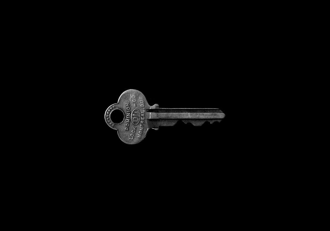 origination moment — photo of key against black background