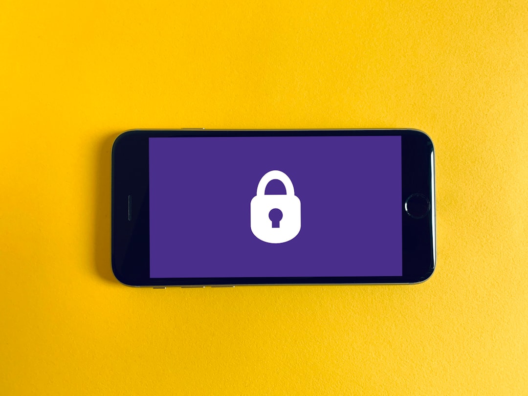 data ownership — black iphone 5 on yellow textile