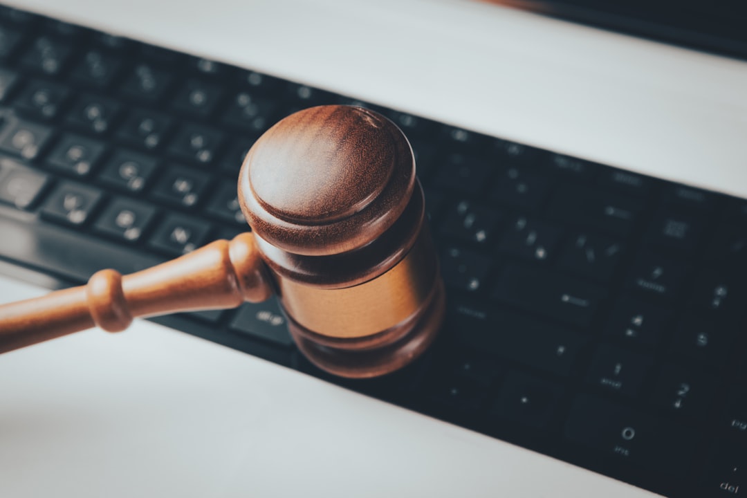 personal data property rights — a wooden gaven sitting on top of a computer keyboard