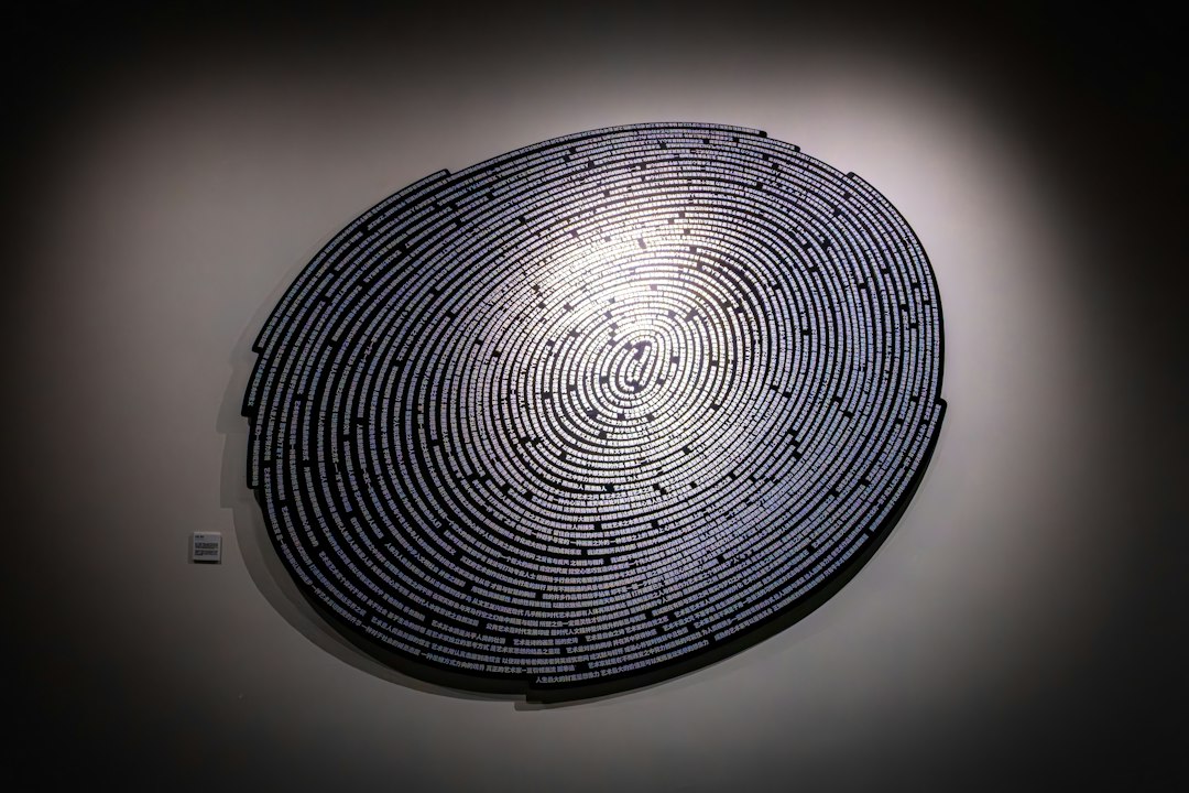 AI copyright lawsuits — Circular abstract artwork with textured blue and white rings
